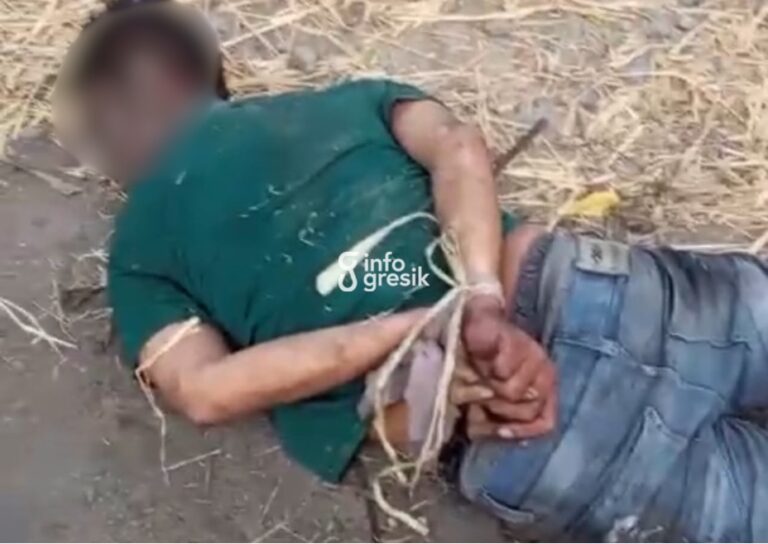 Pelaku DRJ mengalami luka-luka setelah menjadi sasaran amuk massa. (Foto: Ist/Infogresik)